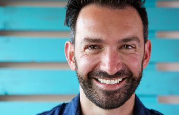 Smiling middle-aged man with a perfect smile.