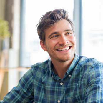 Closeup of cheerful young man