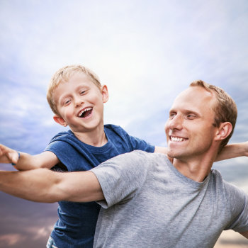 father playing with his son