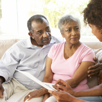 mature african american couple talking with someones